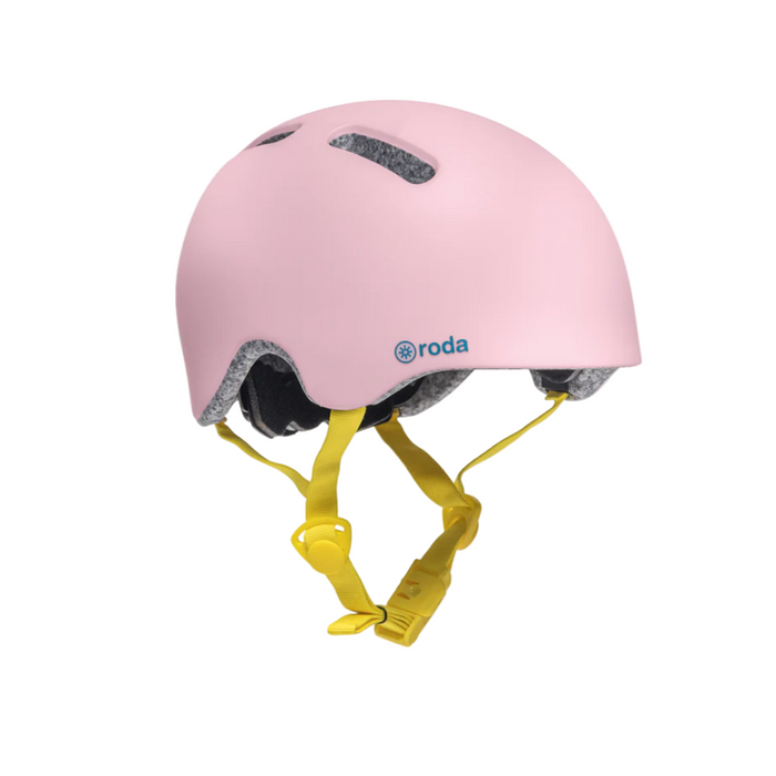 Casco de bicicleta Roda One V2 rosado con correas amarillas, vista en ángulo