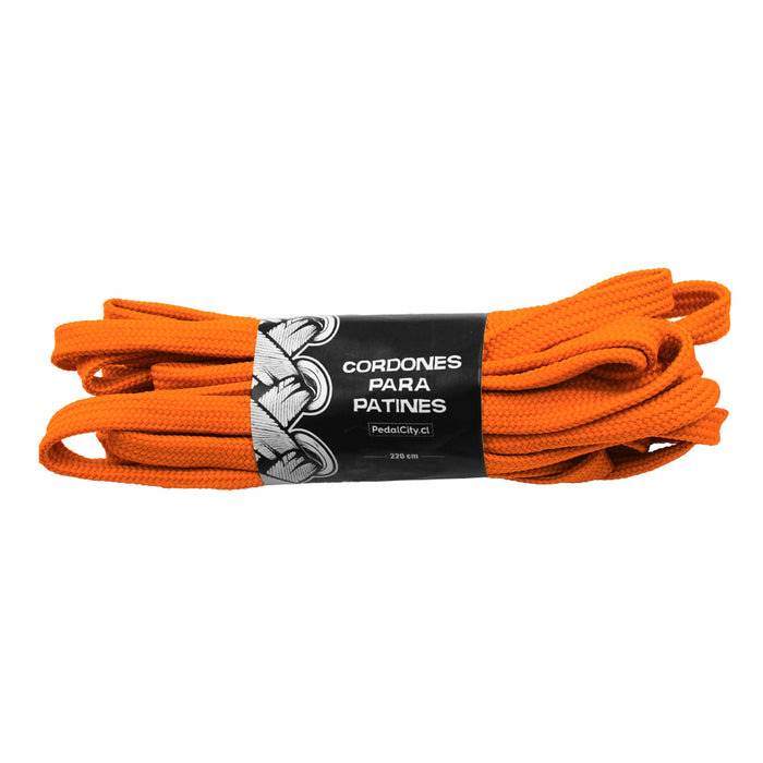 Cordones naranjos para patines Pedalcity en su empaque