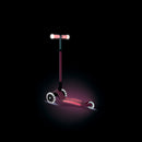 Scooter Globber Elite Glow Lights Coral Pink brillando en la oscuridad