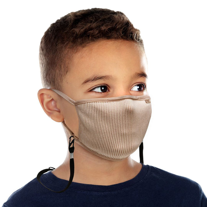 Niño usando la máscara infantil Naroo Fu+ Kids beige con cordón